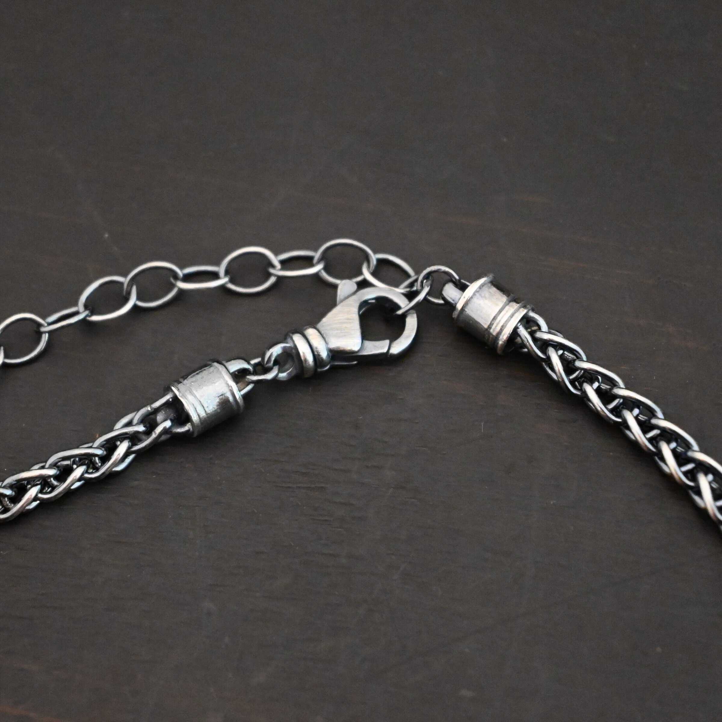 King Cobra Wheat Chain The "King Cobra" Wheat Chain. Chain is handmade out of sterling silver and woven together loosely. Each link is woven to another one and there are sterling silver end caps on each end of the chain. Chain has a lobster claw clasp and comes with a 3 inch extension. Lobster claw clasp is the main part of the photo.