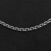 Close up of an oxidized sterling silver Savannah Chain with circle links that is laying against a dark background. Links measure 3x2mmx.7mm thick.