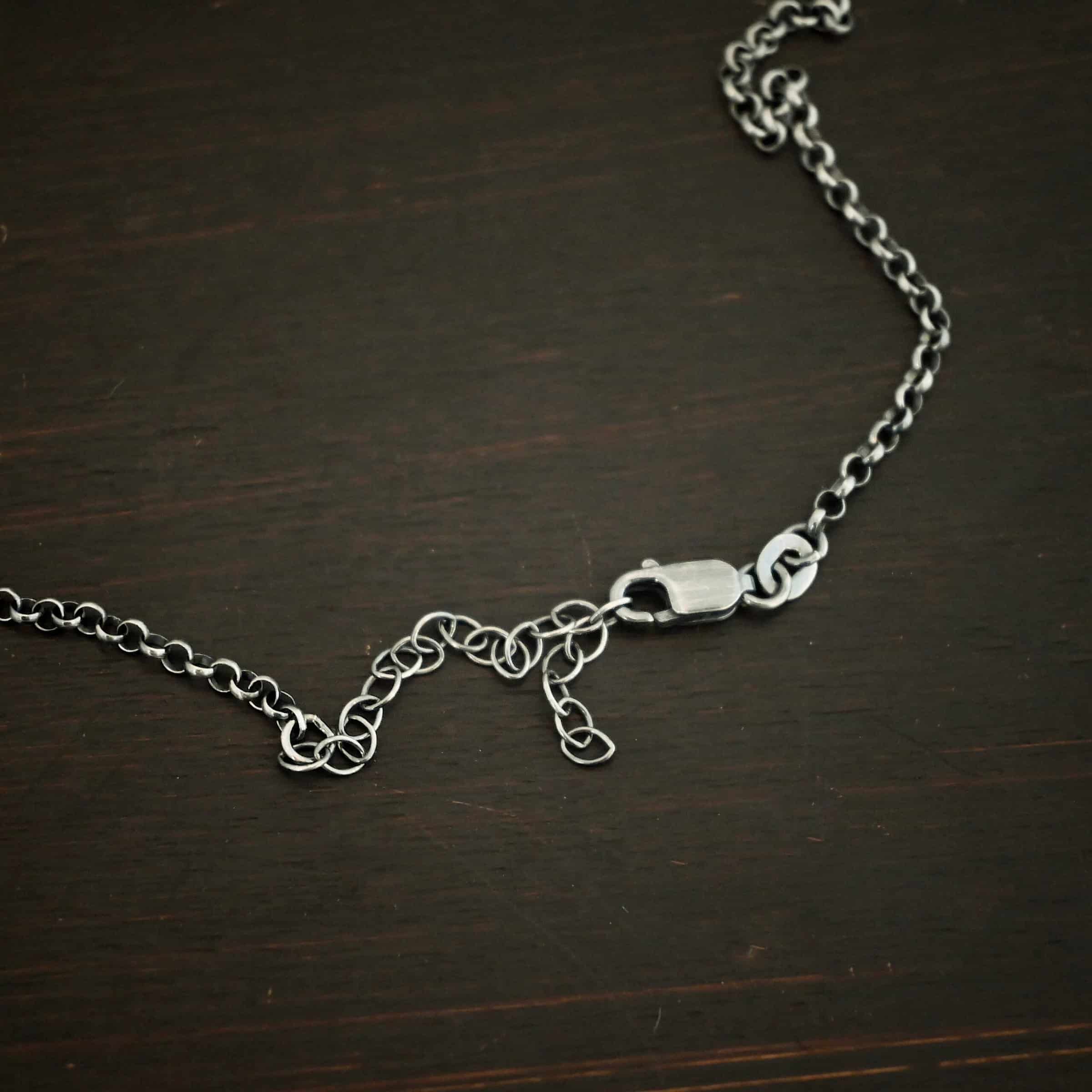 Lobster claw clasp for the "Rachel Rolo" Chain as oxidized. Made out of sterling silver and comes with the 3 inch extension. Chain is made out of small but thick circles.