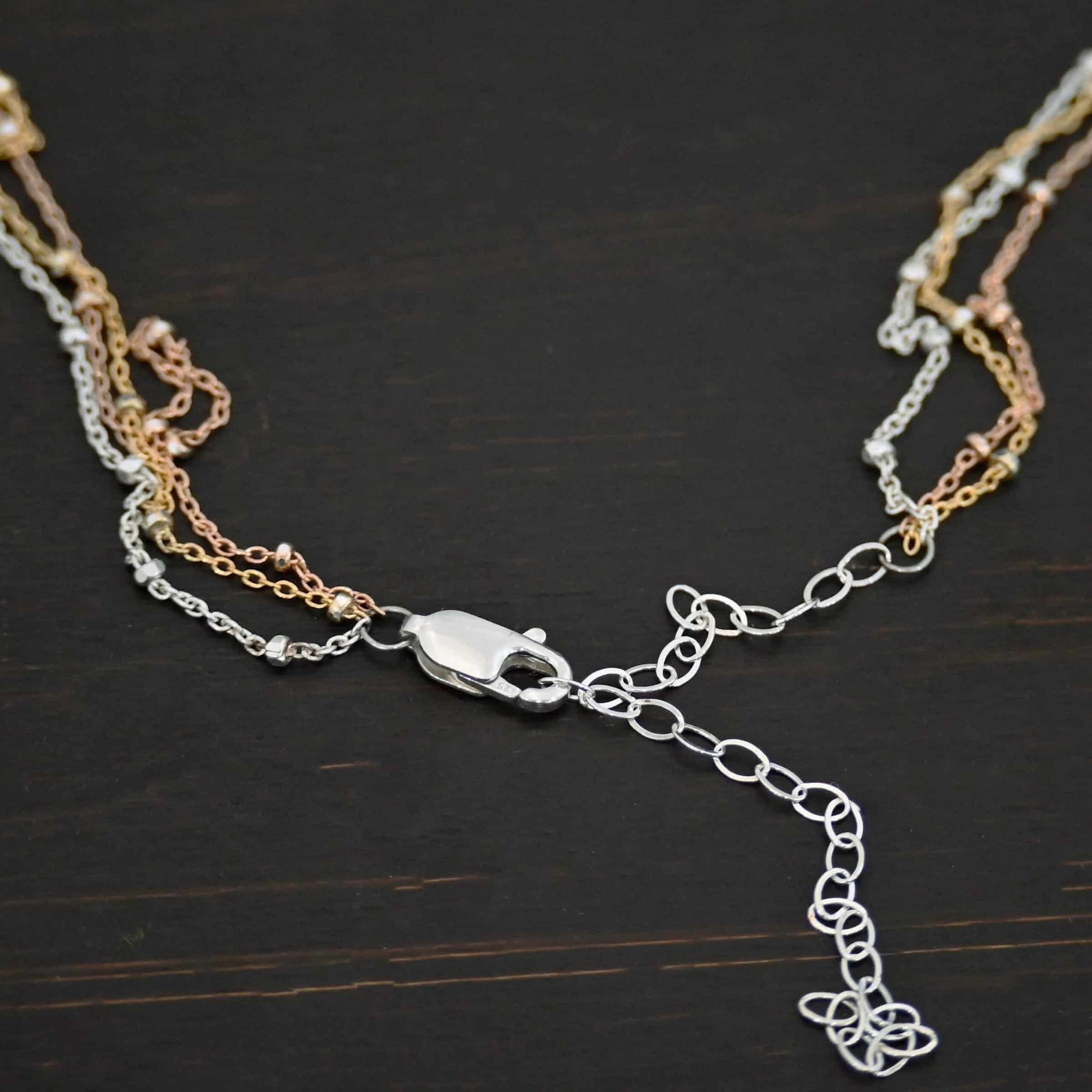 Champagne in Paris shiny "Champagne In Paris" Chain as shown up close. shiny Sterling Silver, 14K Rose Gold Filled, & 14K Yellow Gold Filled chain 1.2mm thick. Chain has a shiny lobster claw clasp with a two inch sterling silver chain extension.