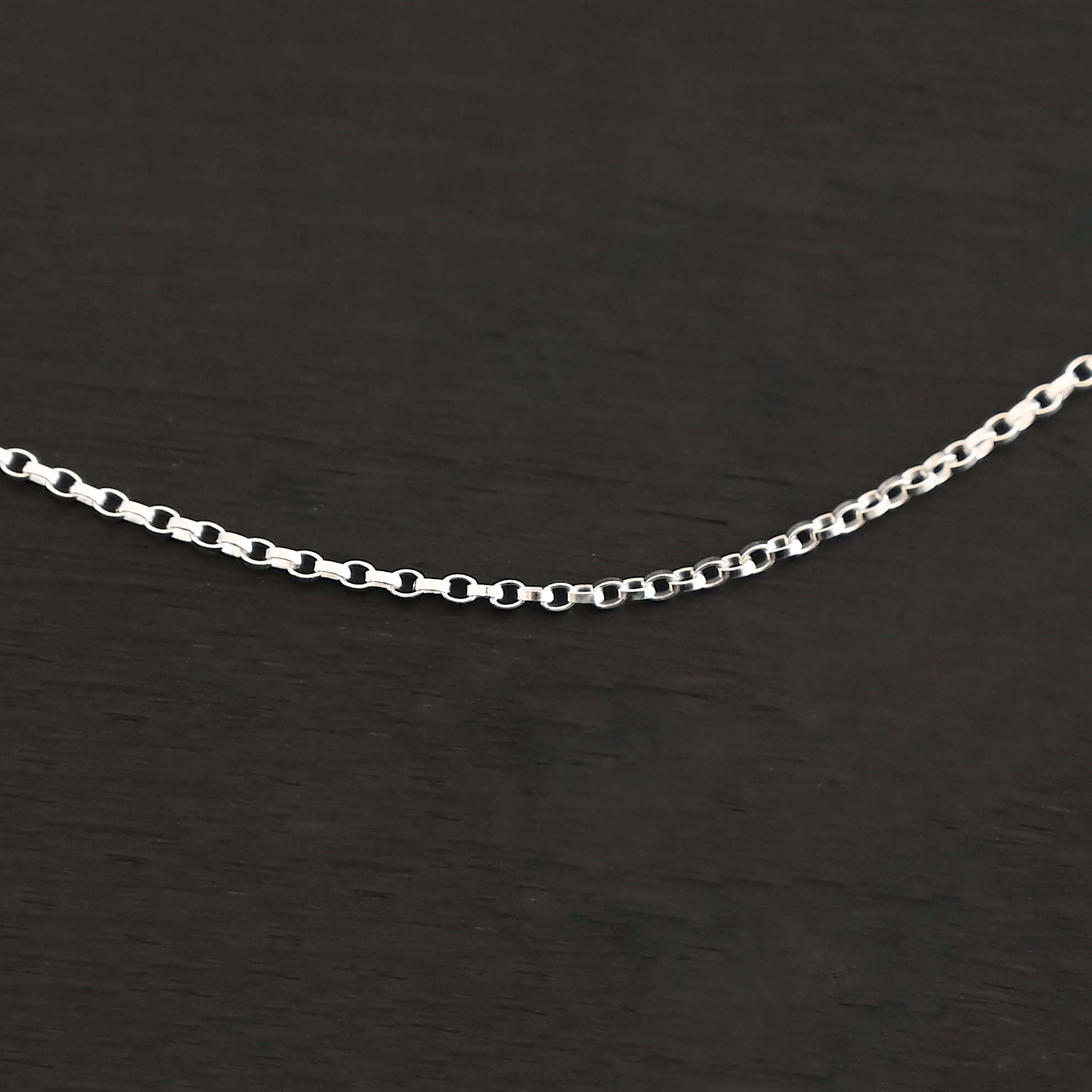 Cassie Chain "Cassie" Chain. The chain is very small oval links that connect together. Chain is shiny.