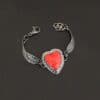 Heart On Fire Bracelet new "Heart On Fire" Bracelet. The bracelet is a rosarita heart with medium sized angel wings on each side. The angel wings curve lightly so they can fit around the wrist. There is two layers of hammered sterling silver around the heart. Bracelet has a silver lobster claw clasp.